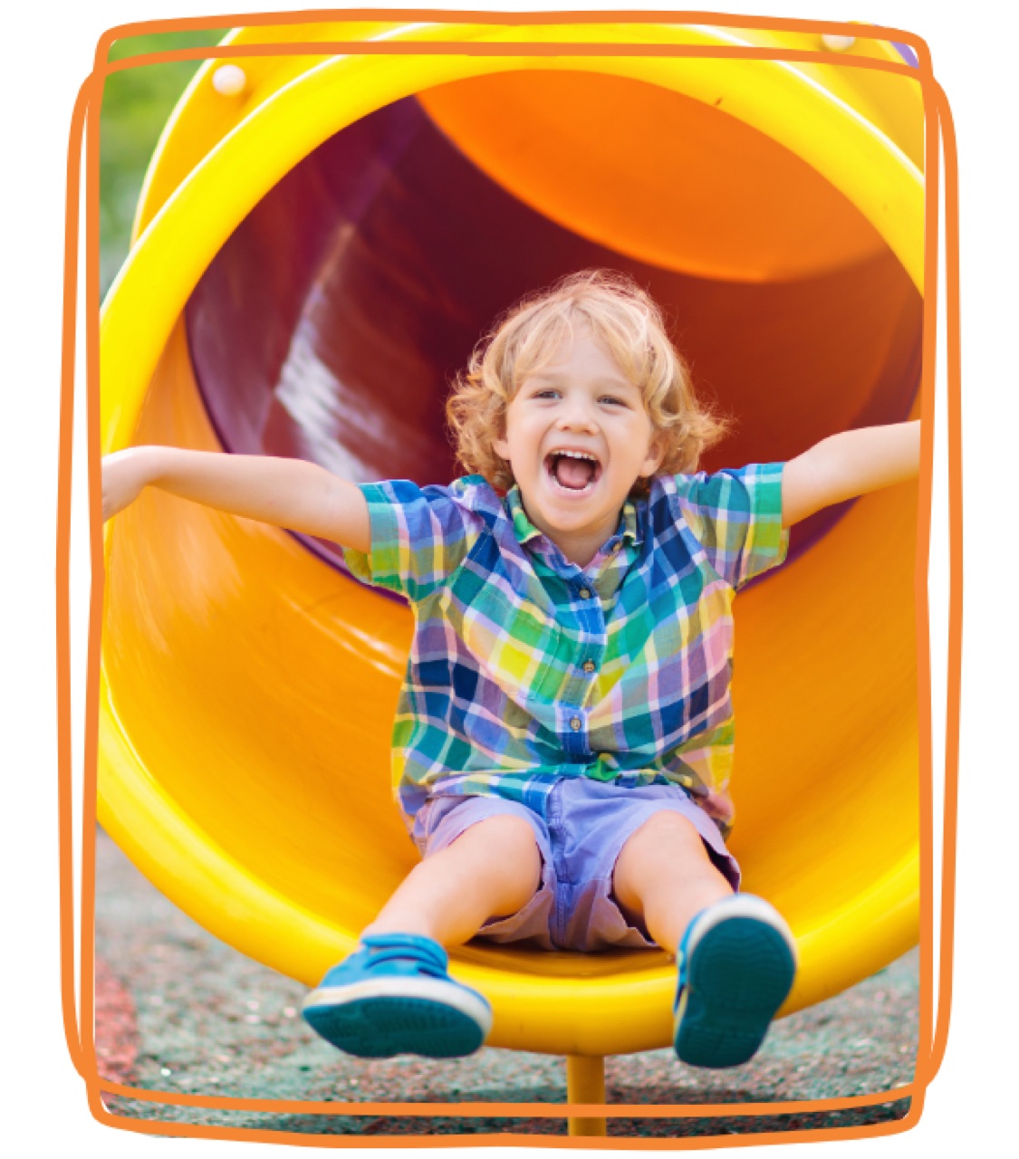 A child smiling during a therapy session at Project MIND